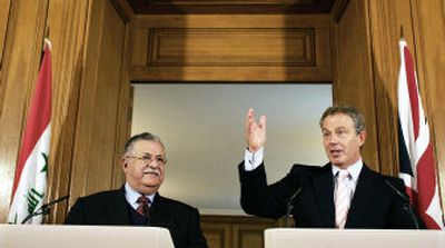
Britain's Prime Minister Tony Blair, right, gestures during a news conference with Iraqi President Jalal Talabani in London on Thursday. 
 (Associated Press / The Spokesman-Review)