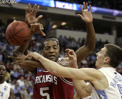 
Arkansas' Darian Townes battles with North Carolina's Tyler Hansbrough in the first half.Associated Press
 (Associated Press / The Spokesman-Review)