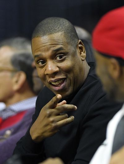 In this Dec. 7, 2016 file photo, rapper Jay-Z appears at a NBA basketball game between the Los Angeles Clippers and the Golden State Warriors in Los Angeles. (Mark J. Terrill / Associated Press)