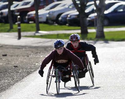 
Christine Nielson, left, and David Watts practice on the Centennial Trail. 
 (Jesse Tinsley / The Spokesman-Review)