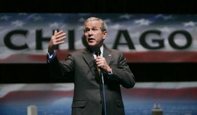 
President Bush answers questions Monday in Chicago. 
 (Associated Press / The Spokesman-Review)