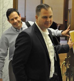 OLYMPIA -- Sens John Braun (foreground) and Andy Hill leave a budget meeting in Gov. Jay Inslee's conference room on Thursday, June 4, 2015.  (Jim Camden/Spokesman-Review)