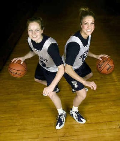 
Former Ferris Saxons Jackie Albi, left, and Angie Clift have reunited on the women's basketball team at Community Colleges of Spokane.  
 (Colin Mulvany / The Spokesman-Review)