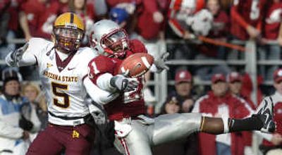 
WSU defensive backs, including Chima Nwachukwu who nearly made this interception, benefited from an aggressive game plan on Saturday. 
 (Christopher Anderson / The Spokesman-Review)