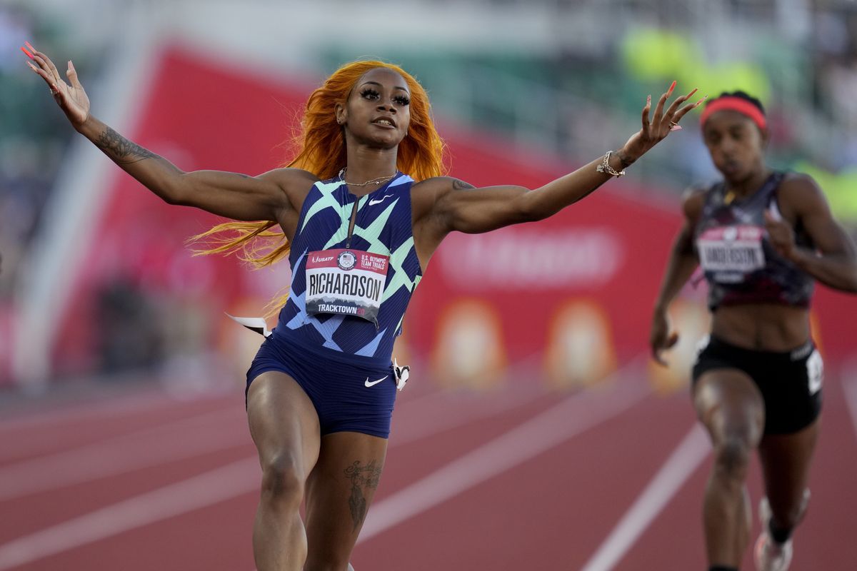 Sha’Carri Richardson celebrates after winning the fourth heat of the women’s 100 meters Friday at the U.S. Olympic Track and Field Trials.  (Associated Press)
