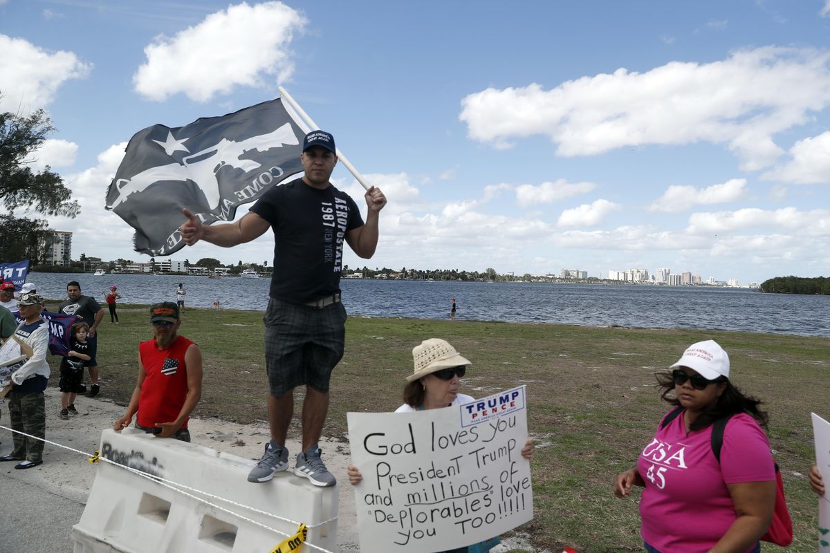Supporters of President Donald Trump gather outside Mar-a-Lago, Saturday, in Palm Beach, Florida. (Alex Brandon / AP)