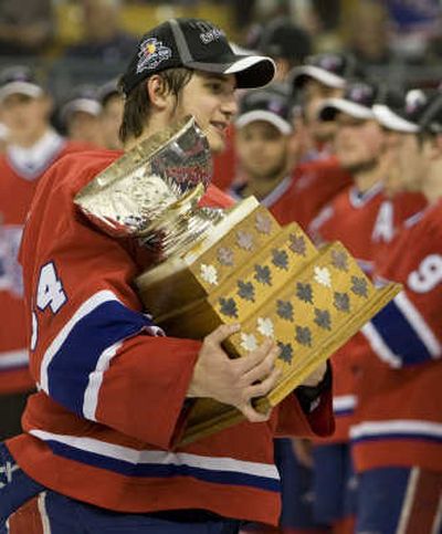 
Chiefs goaltender Dustin Tokarski holds his MVP trophy. Associated Press
 (Associated Press / The Spokesman-Review)