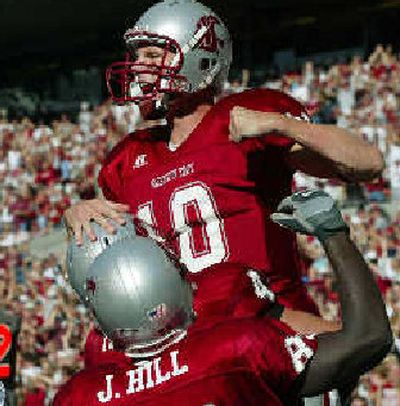 
Alex Brink (10) and the Cougars are all pumped up, looking for nine or 10 wins. 
 (Associated Press / The Spokesman-Review)