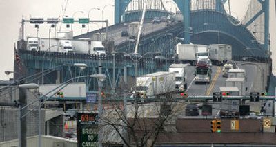 
Passenger and commercial vehicles cross the Ambassador Bridge, which connects Detroit with Windsor, Ontario. The bridge is the busiest vehicle border crossing in North America. 
 (Associated Press / The Spokesman-Review)