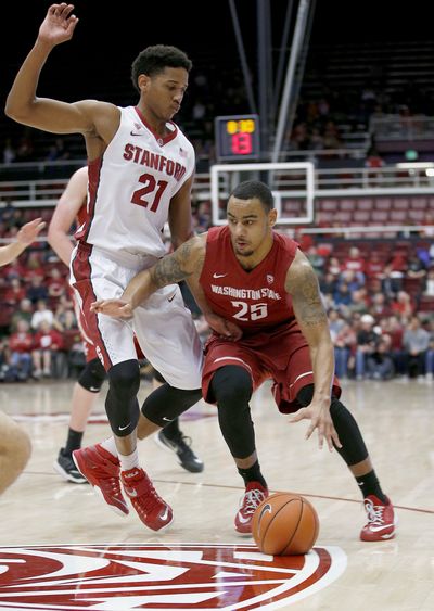 WSU’s DaVonte Lacy drives around Anthony Brown. (Associated Press)