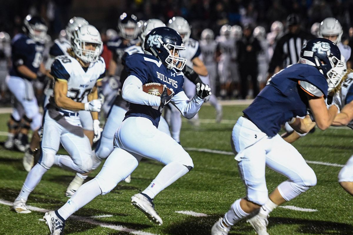 Gonzaga Prep running back Chase Becker runs the ball against Mead in the first quarter during a GSL high school football game, Fri., Oct. 4, 2019, at Gonzaga Prep. . (Colin Mulvany / The Spokesman-Review)