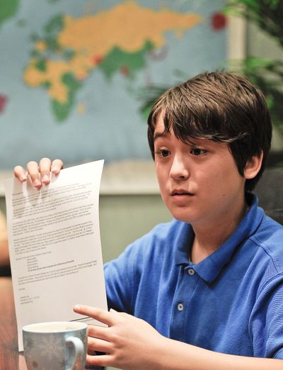 In  Beijing on Wednesday, Jonathan Lee shows a letter he hopes to give to Kim Jong Il.  (Associated Press)