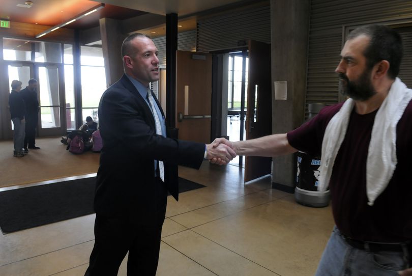 Freeman Schools Superintendent Randy Russell introduces himself to night custodian James Marratt during a visit to the high school last Thursday. He takes the helm of the district on July 1. (J. Bart Rayniak)