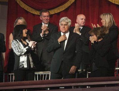 Mark Twain Prize for American Humor honoree Jay Leno is applauded Sunday. (Associated Press)