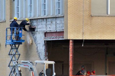 
Crews work on what will be the front entrance of West Valley High School Wednesday.
 (Liz Kishimoto / The Spokesman-Review)