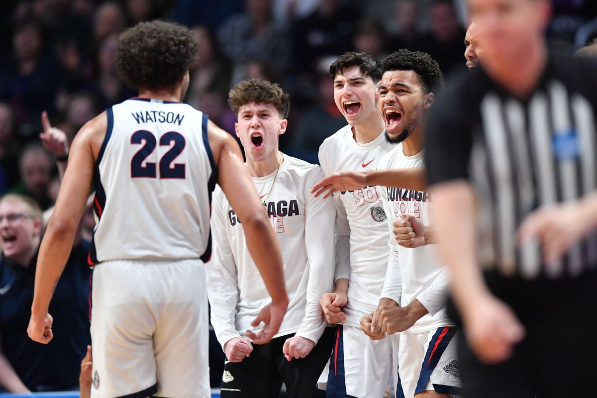 Gonzaga Bulldogs forward Anton Watson (22) celebrates after blocking Grand Canyon Antelopes forward Noah Baumann (20) during the first half of a first round NCAA Basketball Tournament game on Friday, March 17, 2023, at Ball Arena in Denver, Colo.  (Tyler Tjomsland / The Spokesman-Review)