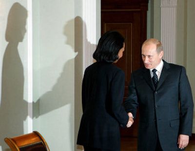 
Russian President Vladimir Putin welcomes U.S. Secretary of State Condoleezza Rice to his Novo-Ogaryovo country residence west of Moscow Saturday. 
 (Associated Press / The Spokesman-Review)