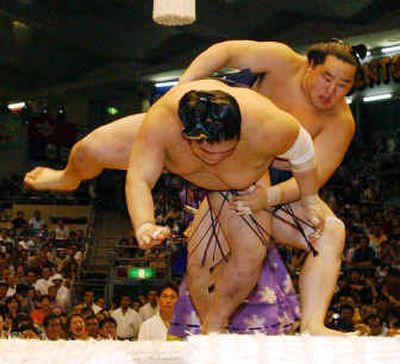 
 There is much more to sumo than what Americans may think. As old as Japan itself, it remains a riveting spectacle: part top-flight athletic competition, part ancient cultural ritual. 
 (Japan National Tourist Organization / The Spokesman-Review)