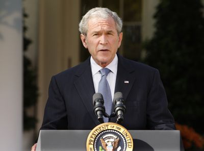 Associated Press Addressing the global economic crisis on Friday from the Rose Garden, President Bush told the nation: “We’re in this together and we’ll come through this together.” (Associated Press / The Spokesman-Review)