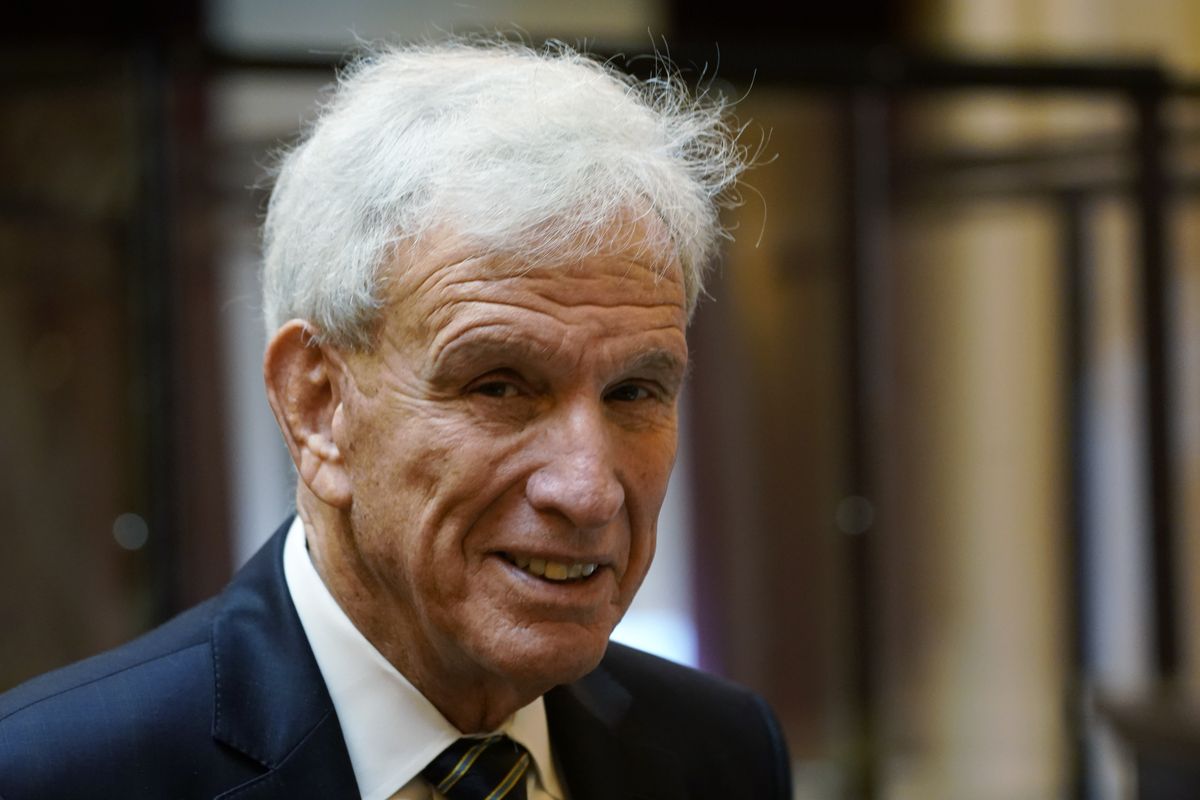 Virginia State Sen. Richard Saslaw, D-Fairfax, speaks to the rostrum staff prior to the start of the Senate session at the Capitol Tuesday Feb. 22, 2022, in Richmond, Va. Saslaw is the chief sponsor of a bill intended to lure the Washington Commanders to the state. (Steve Helber)