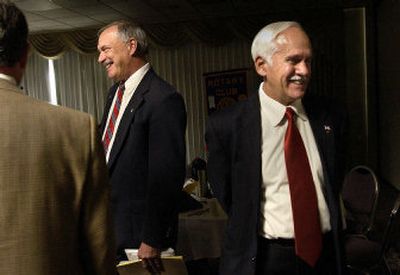 
Spokane County Prosecutor Steve Tucker, left, and Democratic challenger Bob Caruso greet Rotary Club members  on  Monday before their debate. The race will be decided in the general election on Nov. 7. 
 (Brian Plonka / The Spokesman-Review)