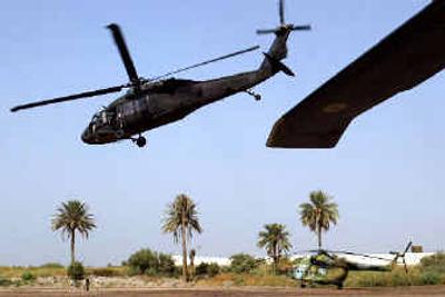 
A U.S. Army Black Hawk helicopter takes off from a base at Babylon south of Baghdad on Monday. The Army's aging fleet of Black Hawk helicopters, which dates back as far as the late 1970s, requires lots of maintenance to keep flying. 
 (Associated Press / The Spokesman-Review)