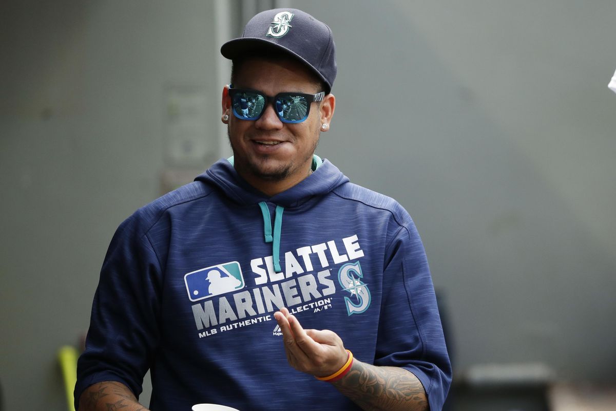 Seattle Mariners starting pitcher Felix Hernandez stands in the dugout during a baseball game against the Houston Astros, Saturday, July 16, 2016, in Seattle. After two minor-league starts during his recovery from an injury, Hernandez is scheduled to return to the Mariners with a start at home against the Chicago White Sox on Wednesday. (Ted S. Warren / Associated Press)