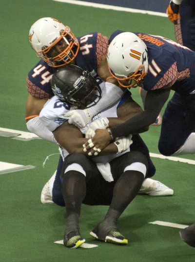 Defensive end James Ruffin, top, said the Shock players need to trust in one another. (Dan Pelle)