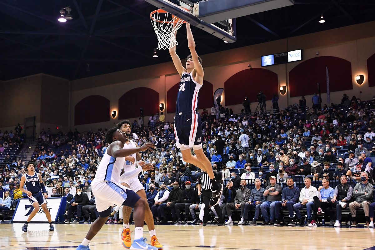 Gonzaga Bulldogs center Chet Holmgren (34) dunks the ball against the San Diego Toreros during the first half of a college basketball game on Thursday, Feb 3, 2022, at Jenny Craig Pavilion in San Diego, Calif.  (Tyler Tjomsland/The Spokesman-Review)