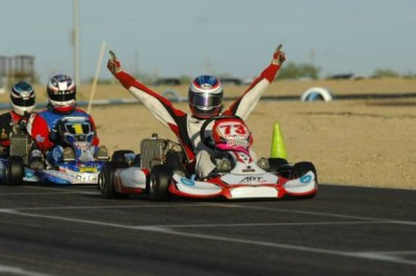 Andrew Zimmer celebrates his victory in Tuscon. (Photo courtesy of Om Track Promotions - otp.ca)