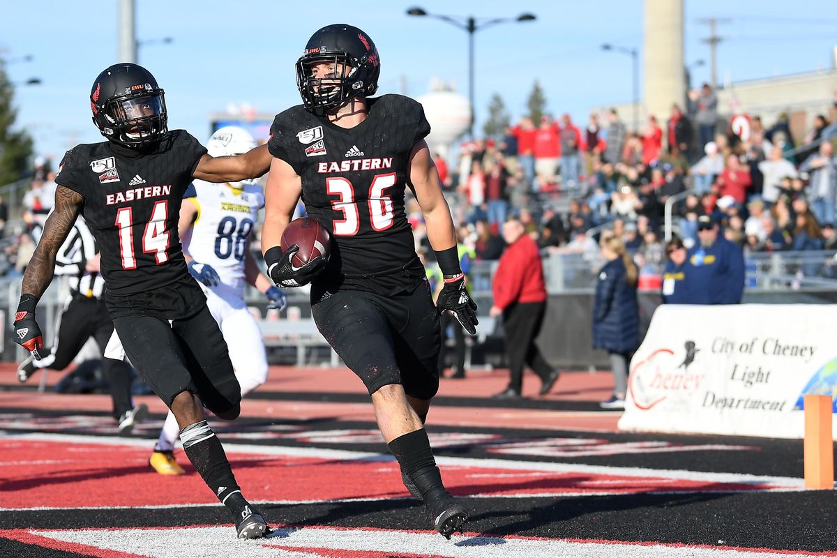 Eastern Washington Eagles linebacker Andrew Katzenberger (36) recovers a fumble by Northern Arizona Lumberjacks quarterback Case Cookus (15) and runs it for a touchdown during a college football game on Saturday, Nov. 2, 2019, at Roos Field in Cheney, Wash. EWU won the game 66-38. (Tyler Tjomsland / The Spokesman-Review)
