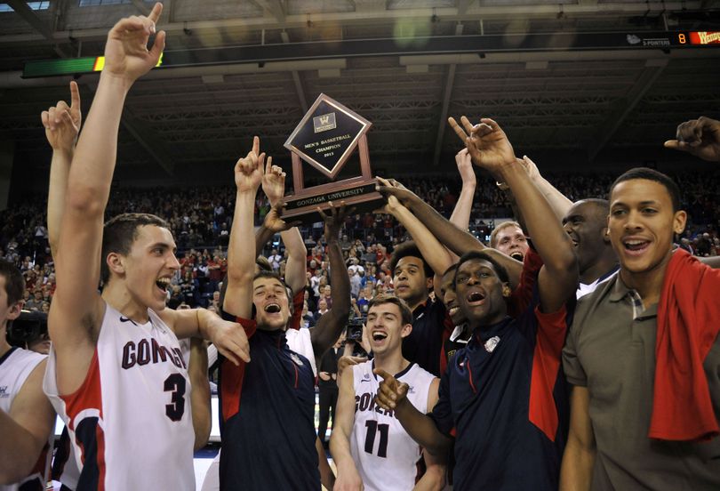 Gonzaga hoist the West Coast Conference Championship Trophy after defeating Portland, March 2, 2013 in Spokane, Wash. (Dan Pelle / The Spokesman-Review)