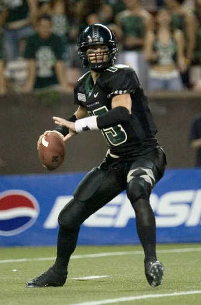 
Hawaii quarterback Colt Brennan placed sixth in Heisman Trophy voting last year when he threw 58 touchdown passes. Associated Press
 (Associated Press / The Spokesman-Review)