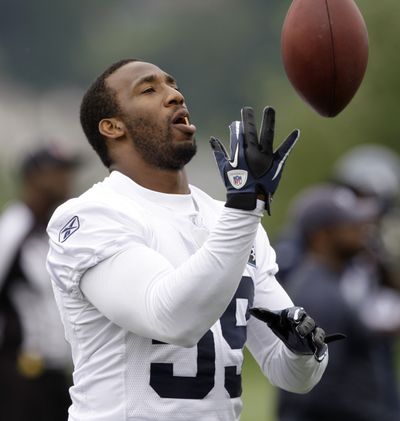 A concussion sidelined Seahawks linebacker Aaron Curry for all of the team’s two-a-day practices.  (Associated Press)