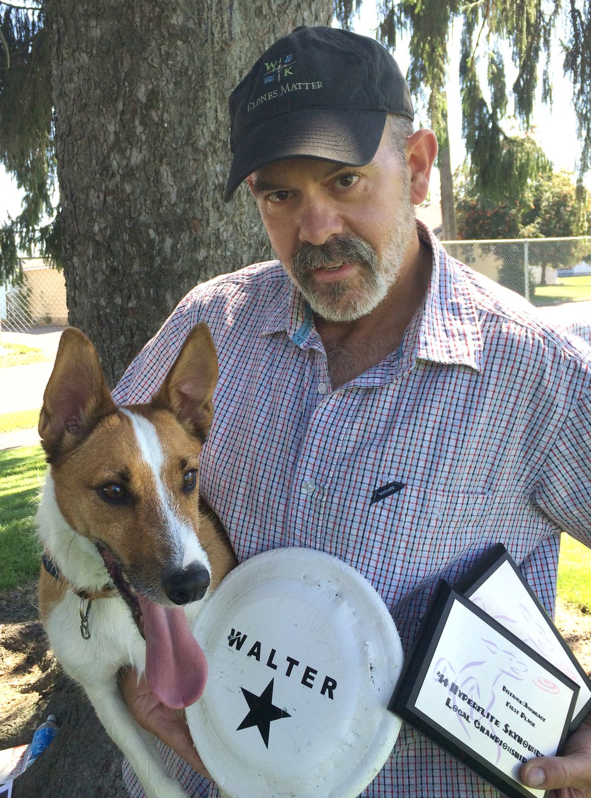 Walter, Spokane’s award-winning Frisbee-catching dog, is seen with his owner, Michael Paul. (Doug Clark)