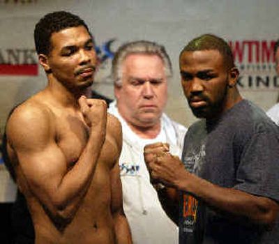 Rubin Williams, left, poses with IBF super middleweight champion Jeff Lacy.
(Associated Press / The Spokesman-Review)