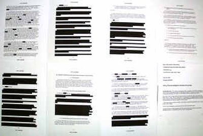 
A view of some pages of a report released by the U.S. Army which clears American soldiers in the death of Italian intelligence agent Nicola Calipari in Iraq, and recommends no disciplinary action following an investigation. 
 (Associated Press / The Spokesman-Review)
