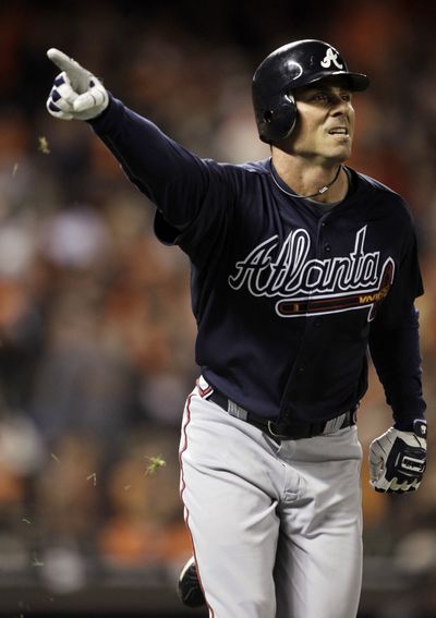 Rick Ankiel of the Braves reacts to his giant home run in the 11th inning.  (Associated Press)