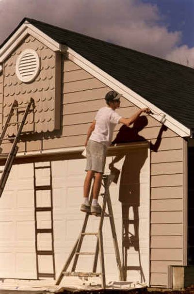 
Painting your home is key to home maintenance. 
 (File/ / The Spokesman-Review)