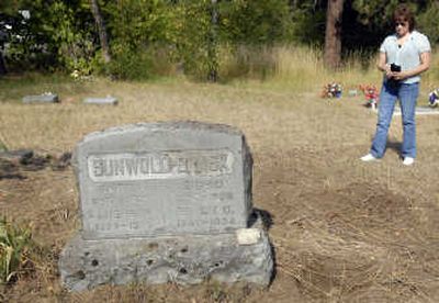 
Chester Cemetery president Wendy Johnson  was the first to discover that someone had dug up yucca plants from a grave at the Spokane Valley cemetery.  