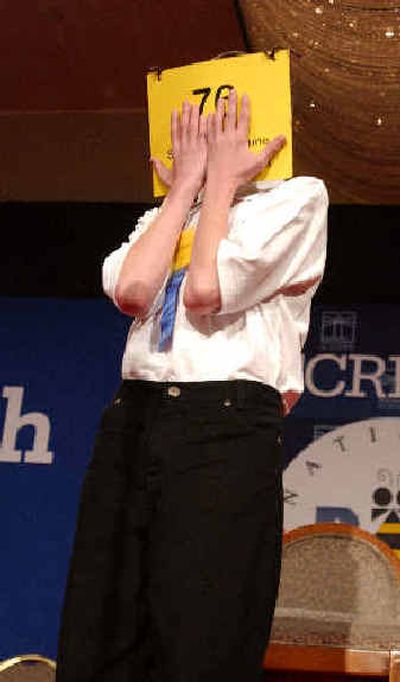 
David Tidmarsh, 14, of South Bend, Ind., covers his face prior to winning the 77th annual National Spelling Bee, Thursday, in Washington. David Tidmarsh, 14, of South Bend, Ind., covers his face prior to winning the 77th annual National Spelling Bee, Thursday, in Washington. 
 (Associated PressAssociated Press / The Spokesman-Review)