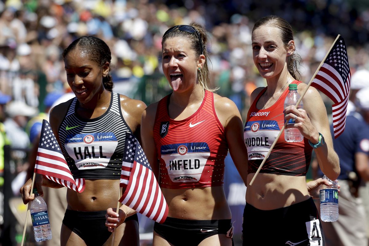 Molly Huddle, winner, right, Emily Infeld, second place, center, and Marielle Hall, third place, celebrate their finish in the women’s 10,000-meter final at the U.S. Olympic Track and Field Trials, Saturday, July 2, 2016, in Eugene. (Marcio Jose Sanchez / Associated Press)