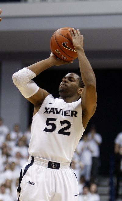 Tu Holloway’s 21 points rallied Xavier past Purdue. (Associated Press)
