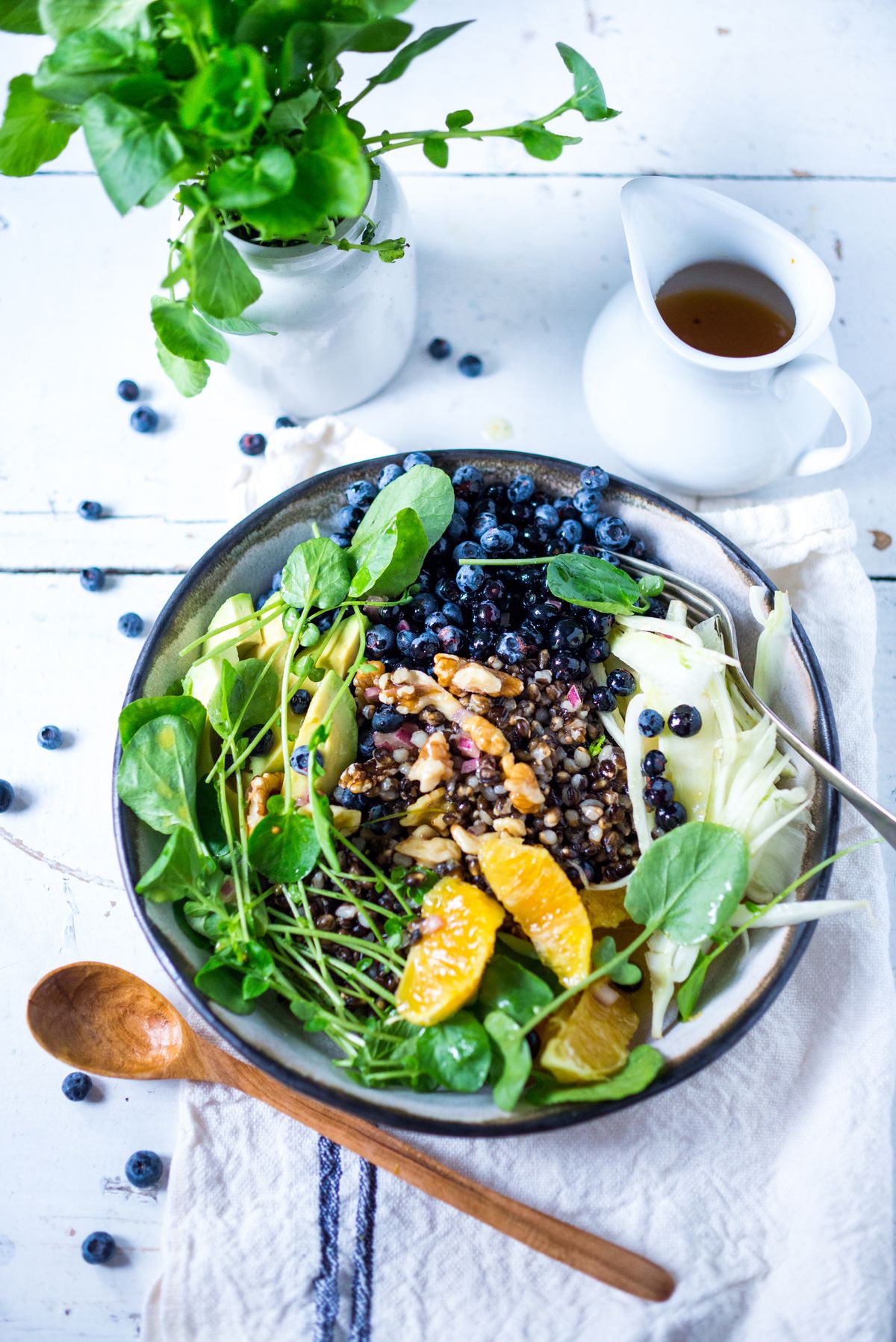 This Summer Glow Bowl pairs blueberries with shaved fennel, oranges, avocado, watercress, walnuts and local Black Nile Barley, then drizzled with a fresh Orange Bee Pollen Dressing. (Sylvia Fountaine)