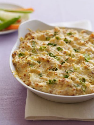 At left, Deviled Shrimp with Bacon: Shrimp and bacon, with help from horseradish and cayenne, give this creamy dip a little kick. At right, Goat Cheese Marinara with Shredded Basil. Both recipes come from Peggy Fallon’s book “Great Party Dips.” (The Spokesman-Review)