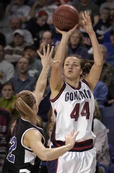 
Gonzaga forward Anne Bailey drills a basket from the left side over Portland's Jamie Medley in the first half Saturday night.
 (Dan Pelle / The Spokesman-Review)