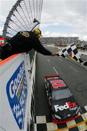 Denny Hamlin crosses the finish line to win the Goody's Fast Pain Relief 500, his second straight victory at Martinsville Speedway. (Photo courtesy of Jason Smith, Getty Images)