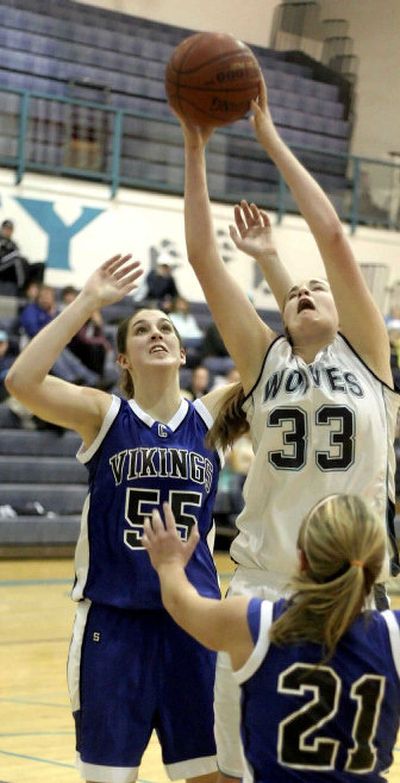 
Lake City's Katie Baker (33) hopes her name will be on the radar of college basketball coaches next fall. 
 (Bruce Twitchell / The Spokesman-Review)