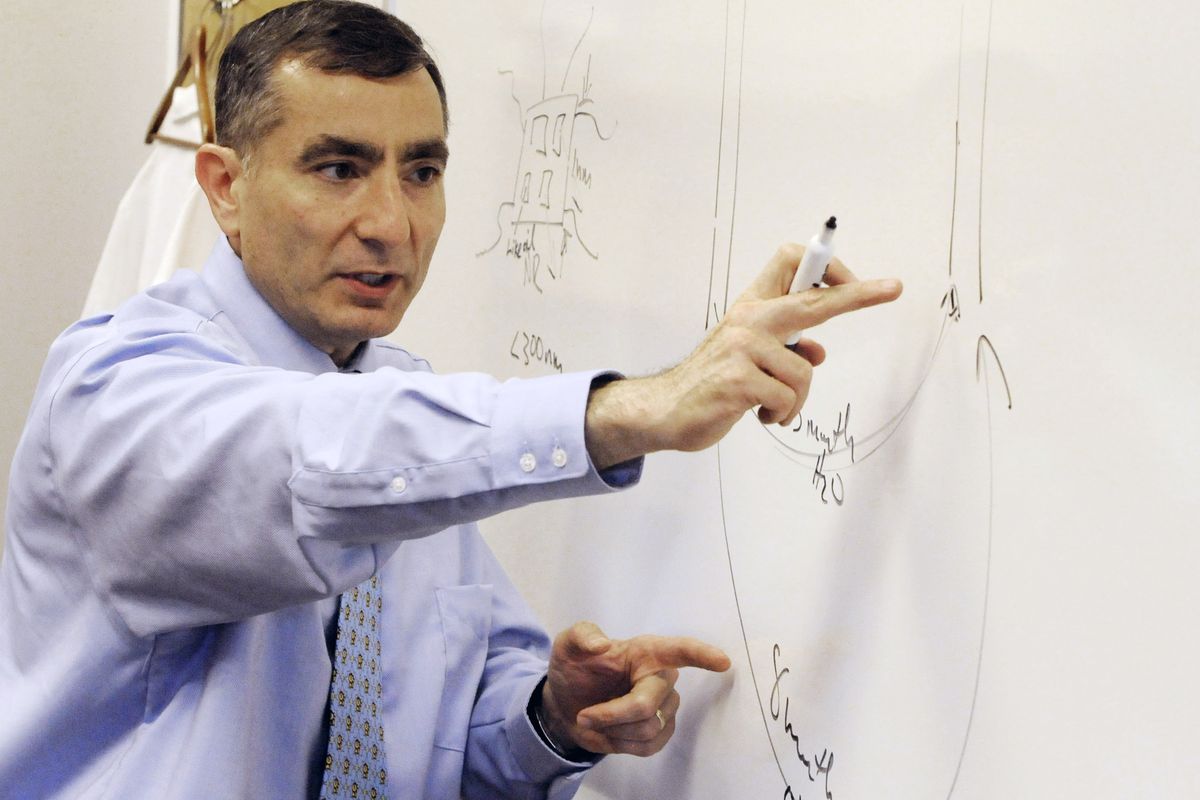 Rice University professor James Tour explains the use of “nanoreporters” to help oil companies to find and recover more oil from current fields. The atom-sized agents, roughly 30,000 times smaller than the width of a human hair, can be injected into wells to detect oil, water and other substances and also provide information about temperature, pressure and other factors that can help a company zero in on more oil. Associated Press photos (Associated Press photos / The Spokesman-Review)