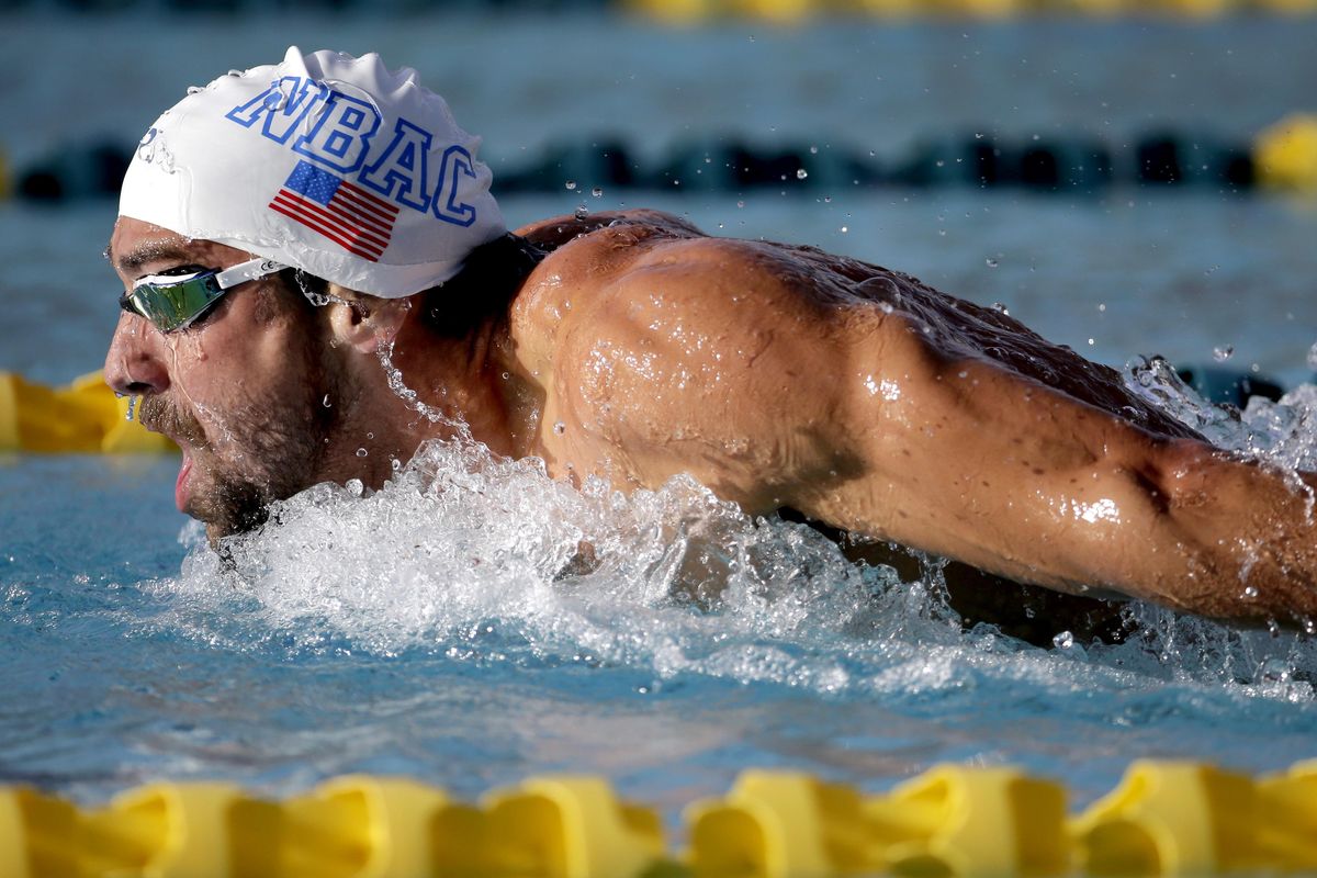 Michael Phelps competes in the 200-meter butterfly final at the Arena Pro Swim Series swim meet, Friday, April 15, 2016, in Mesa, Ariz. (Matt York / Associated Press)